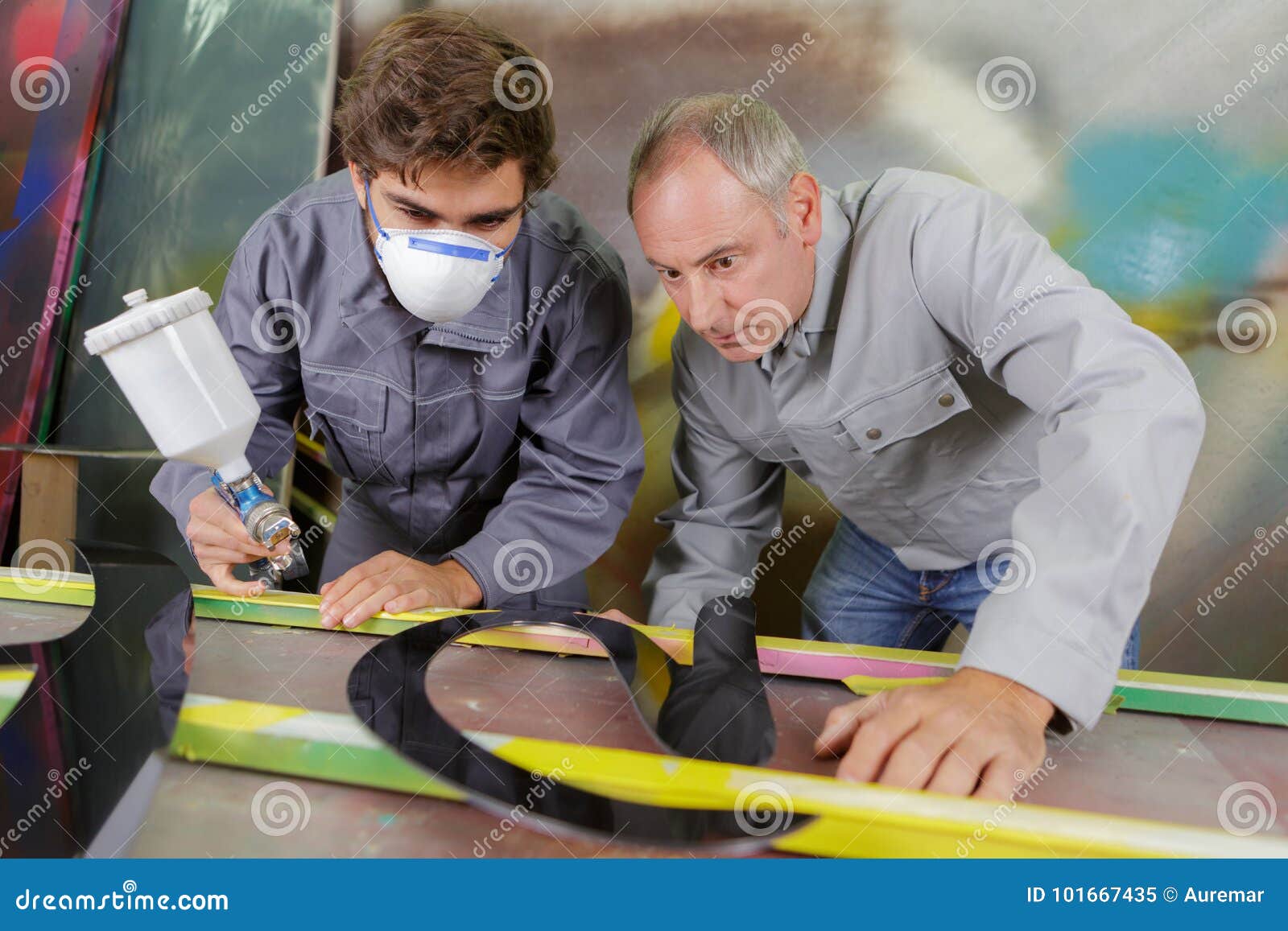 Apprentice Holding Spray Paint Stock Image Image of target, material