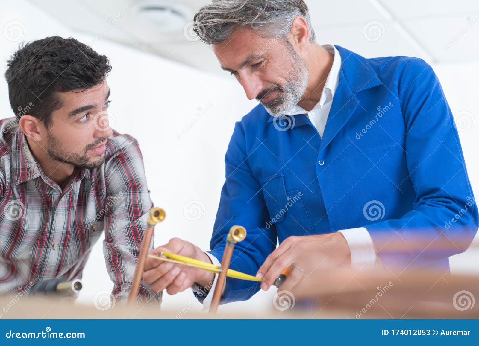 apprentice-plumber-with-master-stock-image-image-of-experience-industrial-174012053