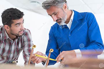 Apprentice Plumber With Master Stock Image Image Of Experience Industrial 174012053