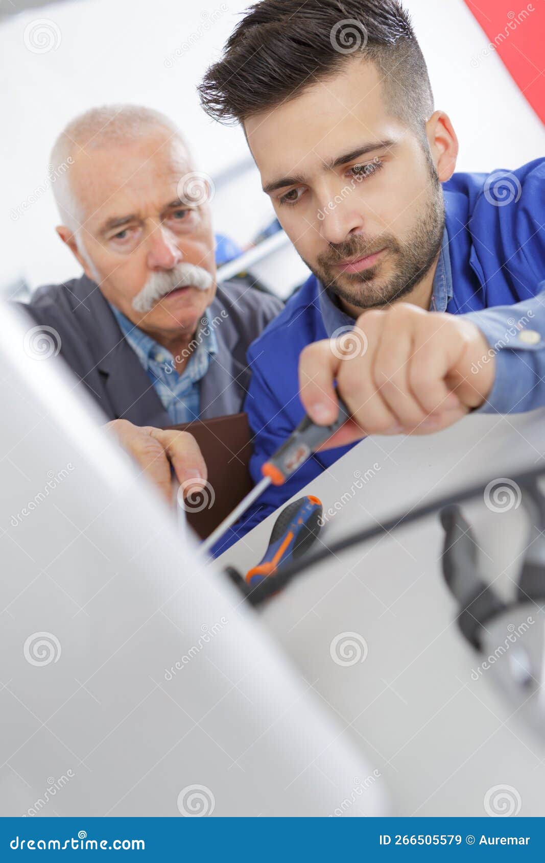 Apprentice Working on Machine Part Stock Image Image of work