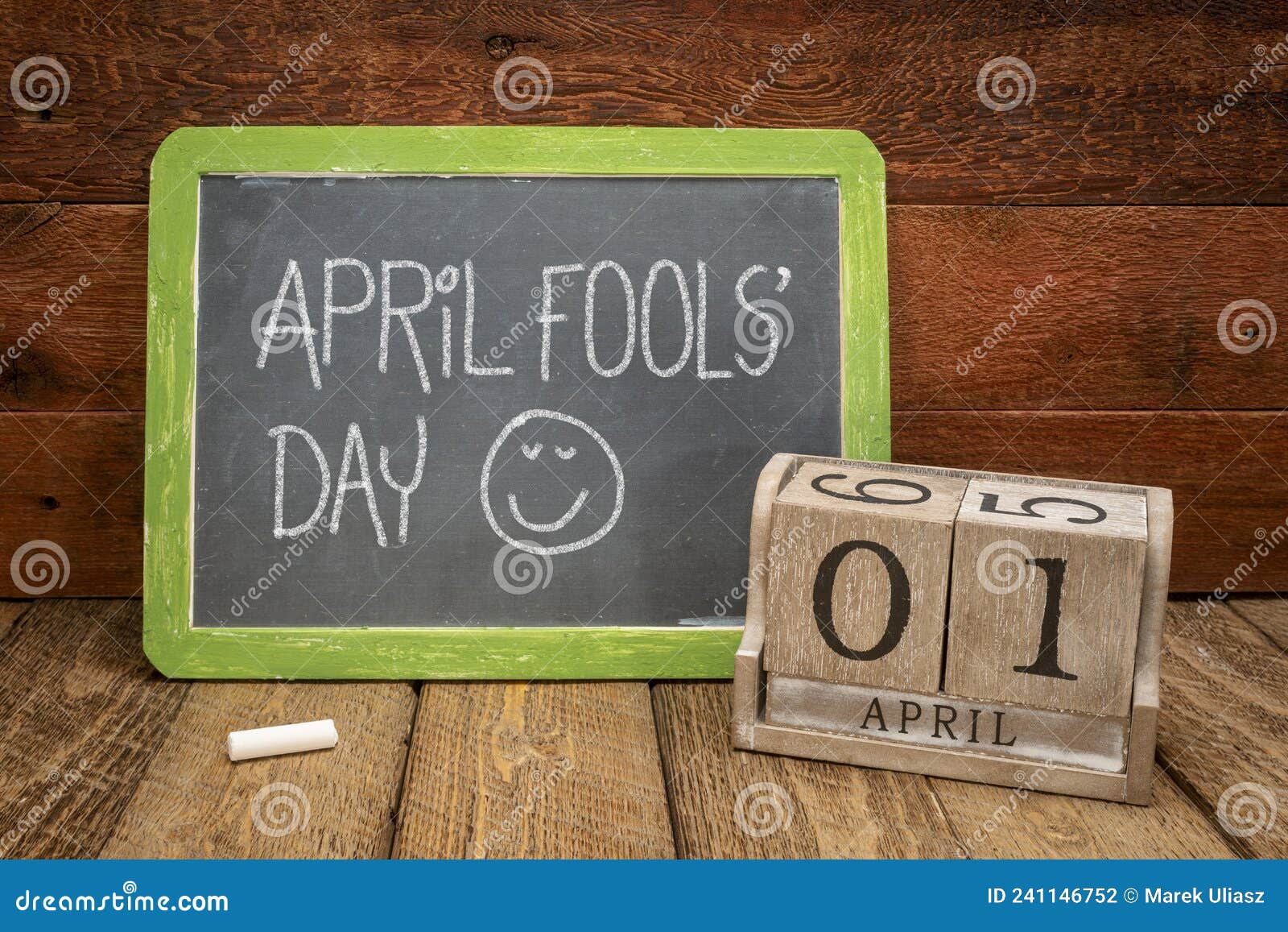 April Fools Day Slate Blackboard with Wooden Calendar Stock Photo