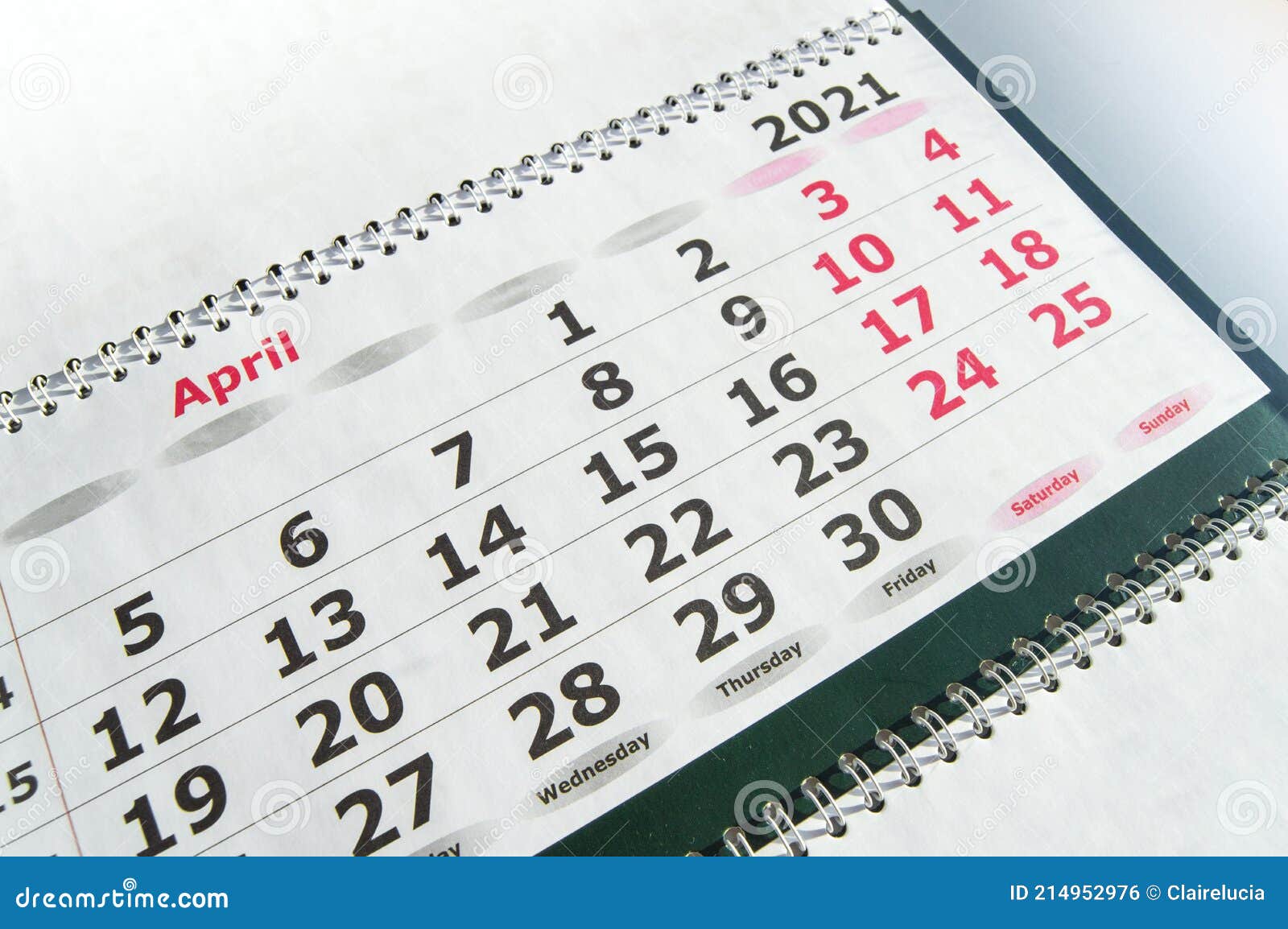 April 2021 Paper Calendar Planner with Spiral, Closeup Stock Photo