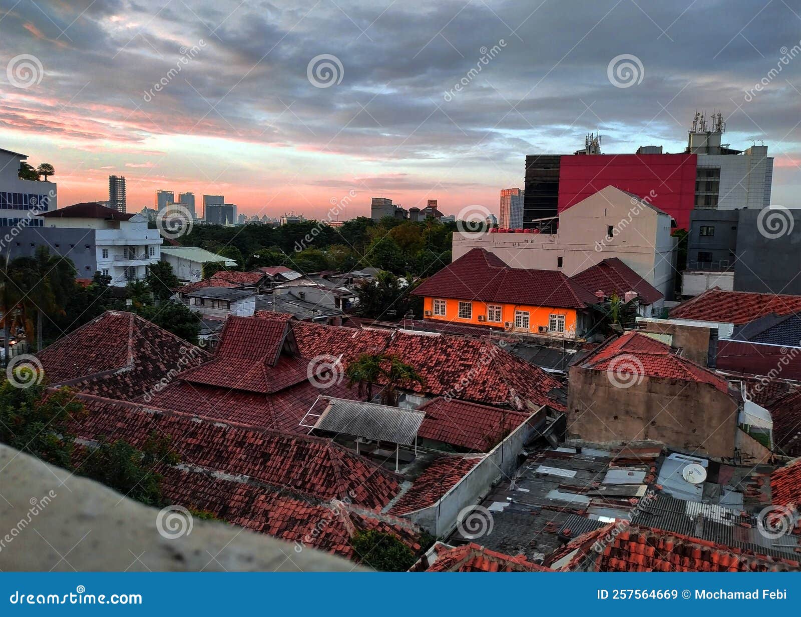 Sunset in Jakarta City stock image. Image of tower, rain 257564669