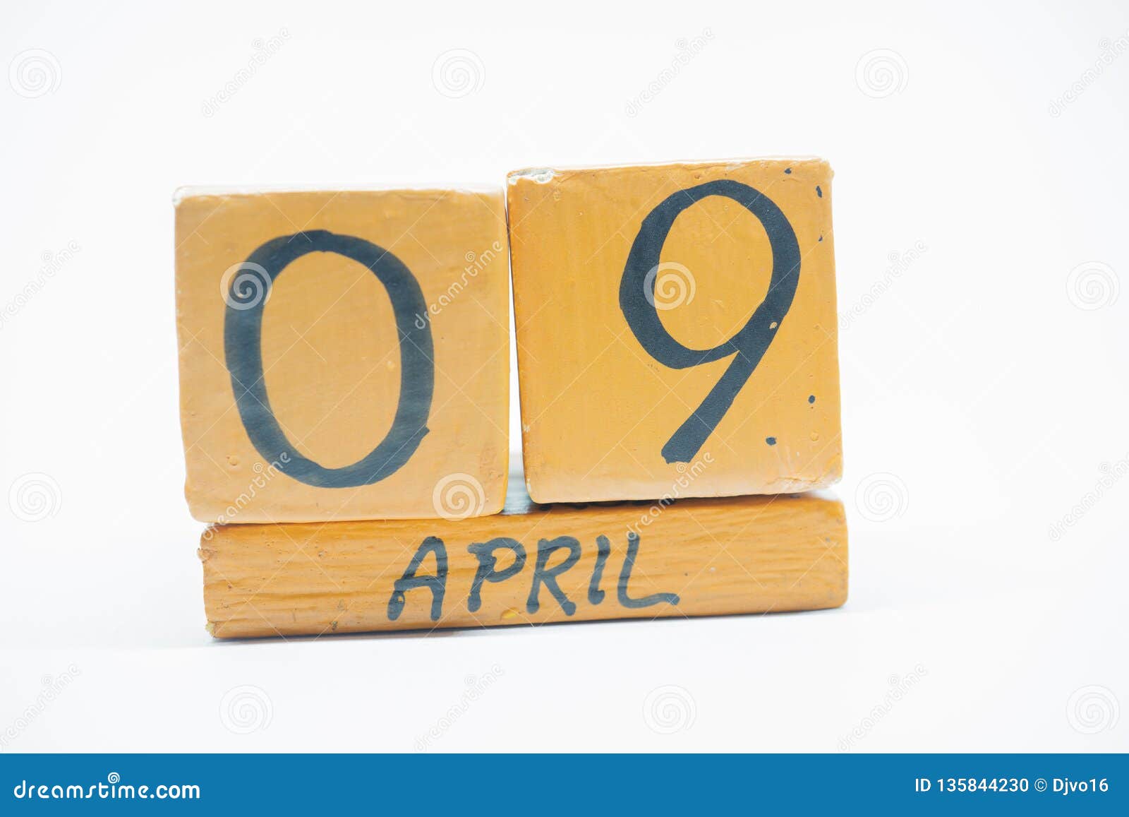 April 9th. Day 9 of Month, Handmade Wood Calendar Isolated on White