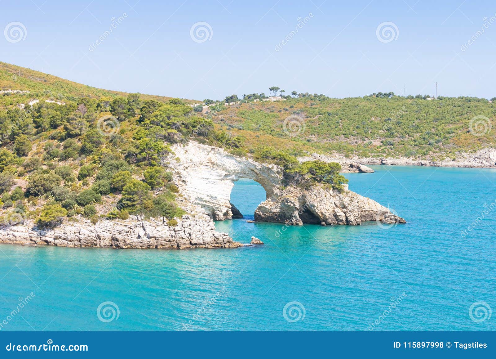 apulia, italy - cliff breakthrough at grotta della campana piccola