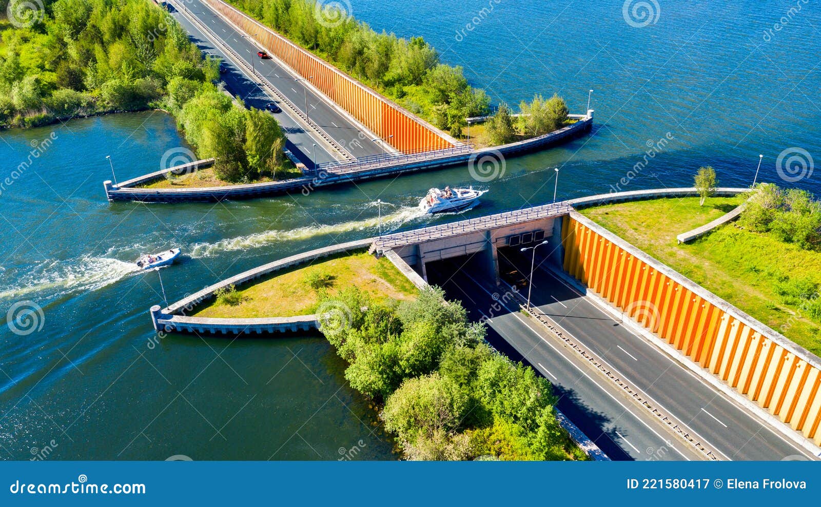 aquaduct veluwemeer, nederland. aerial view from the drone. a sailboat sails through the aqueduct on the lake above the highway
