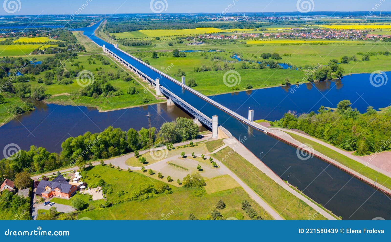 aquaduct veluwemeer, nederland. aerial view from the drone. a sailboat sails through the aqueduct on the lake above the highway