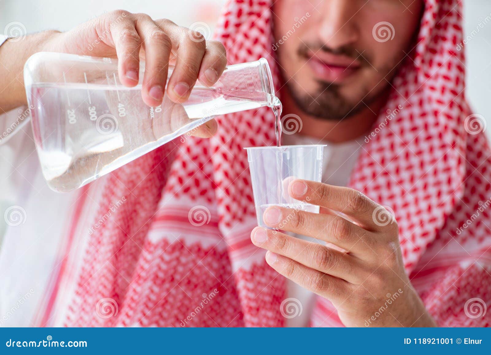 The Arab Chemist Checking the Quality of Drinking Water Stock Image