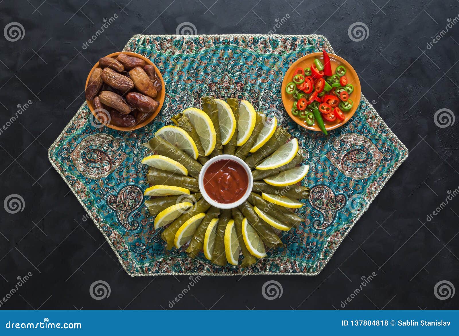 Arab Dolma of Grape Leaves with Pomegranate Seeds. Stock Photo Image