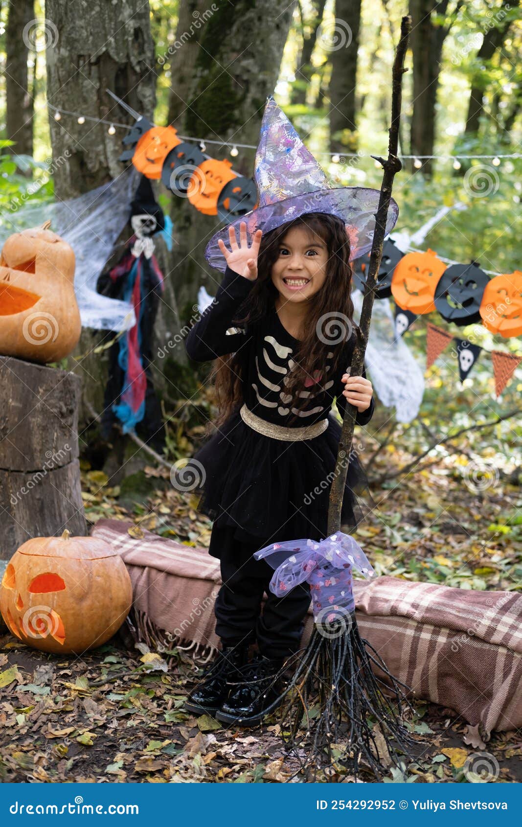 Arab Girl in Halloween Costume and Witch Hat with Broom in Halloween ...