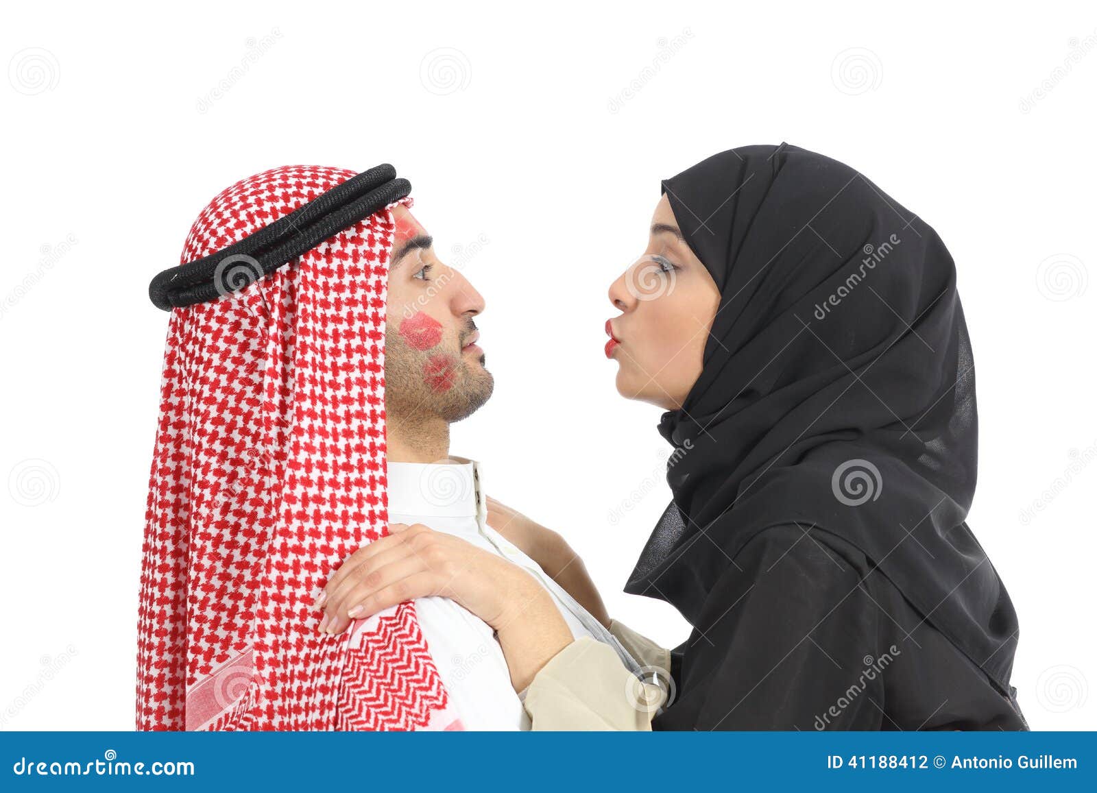 Arab Saudi Obsessed Woman Kissing a Man Stock Photo pic