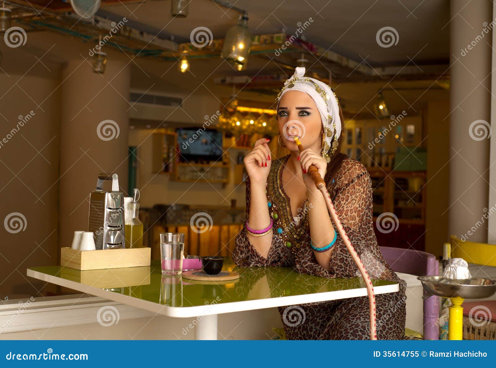 Arabian Lady Smoking Hookah In The Coffee Shop Royalty Arabian Lady Smoking Hookah In The Coffee Shop Royalty