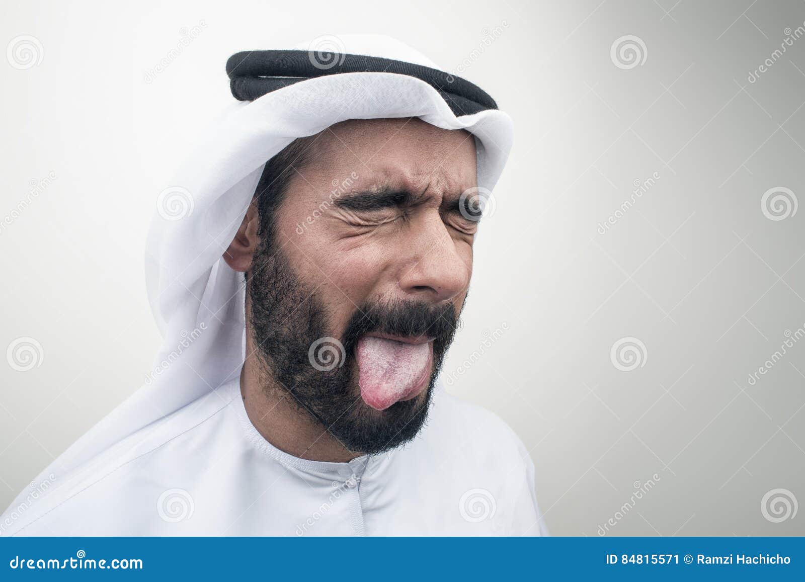 Arabian Man Sticking Out His Tongue, Arabian Guy with Funny Expression..  Stock Image - Image of middle, expressive: 84815571