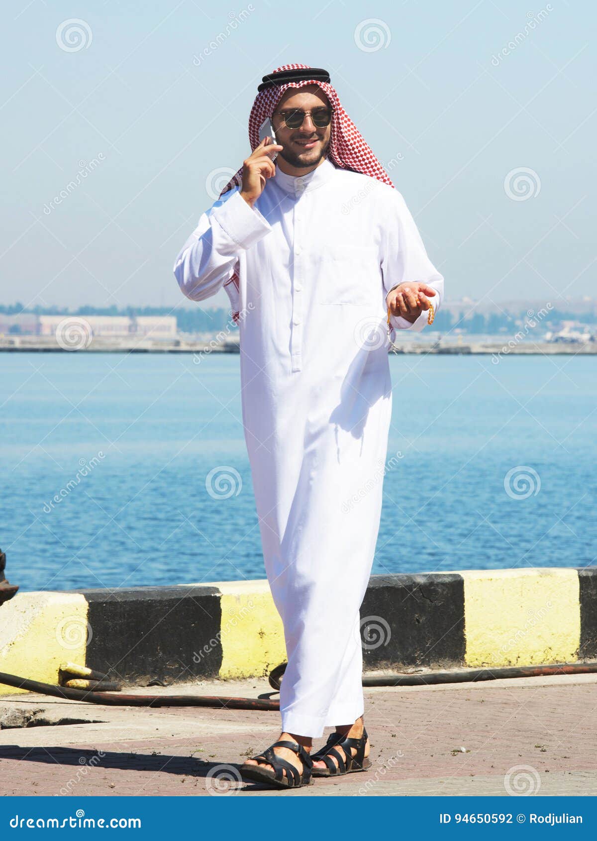 Arabian Man Talking on the Cell Phone in the Port Stock Photo - Image ...