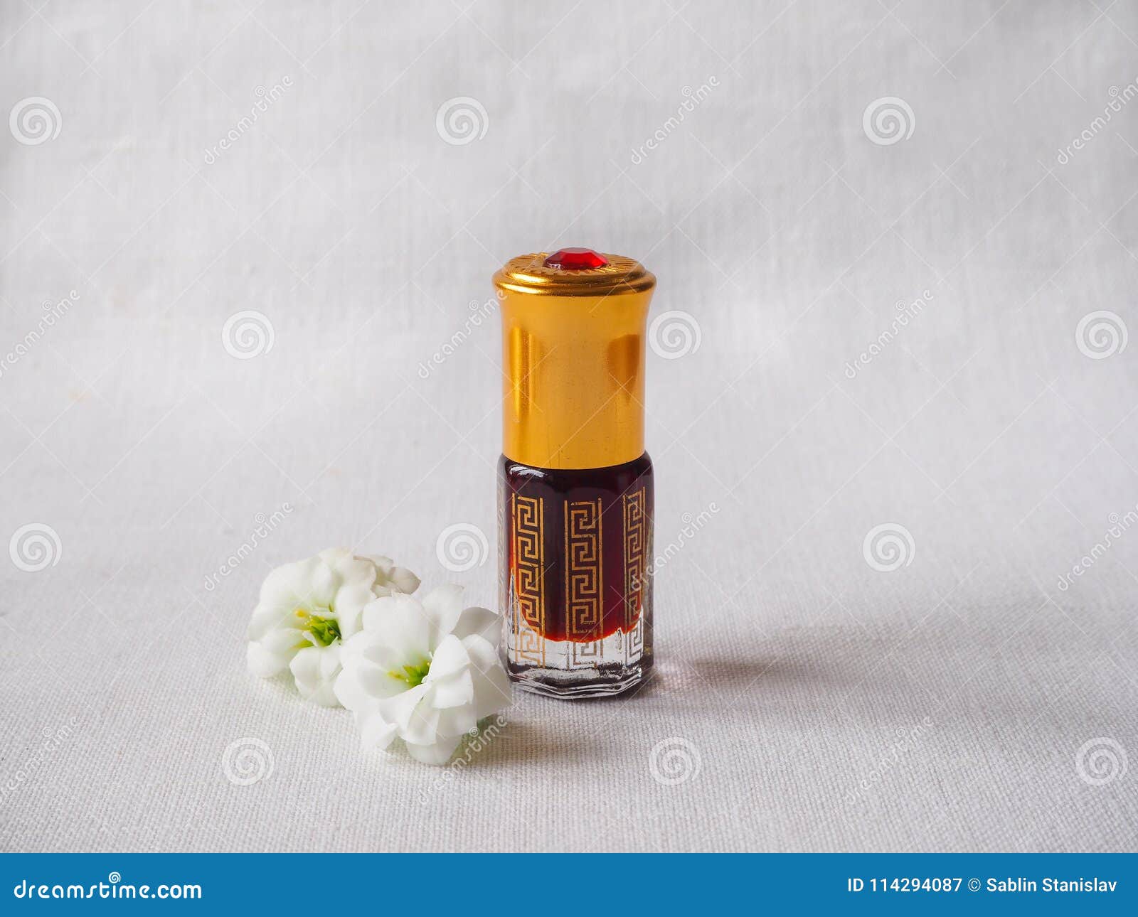 Arabian oud attar perfume or agarwood oil fragrances in mini bottles. Elite Arab perfume in a crystal bottle. Attar Oud oil