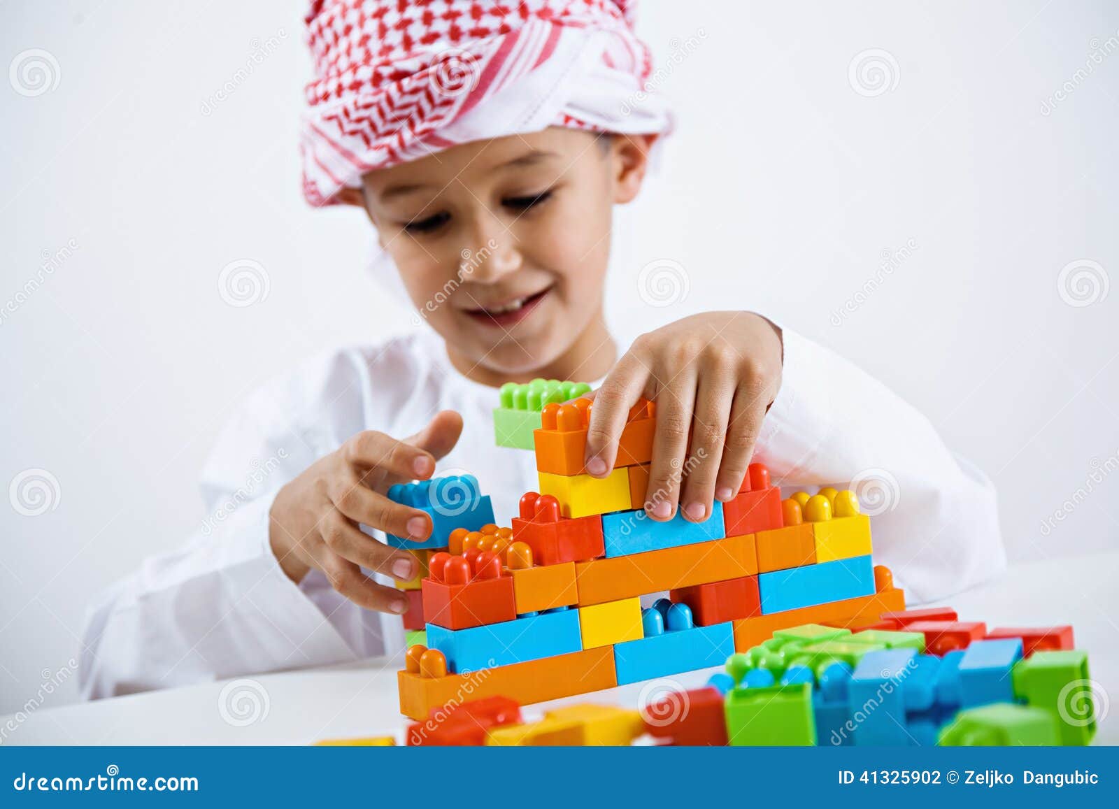 Arabic little boy playing stock photo. Image of kids 41325902