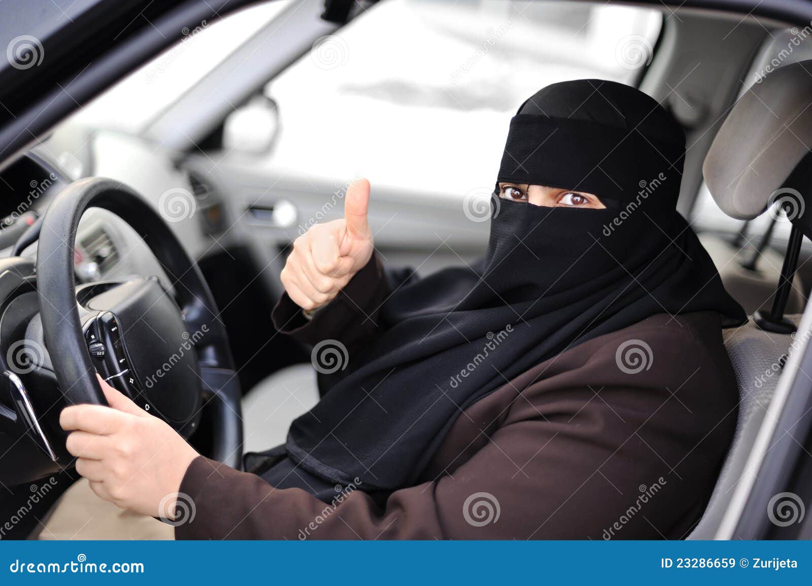 arabic muslim woman driving car 23286659