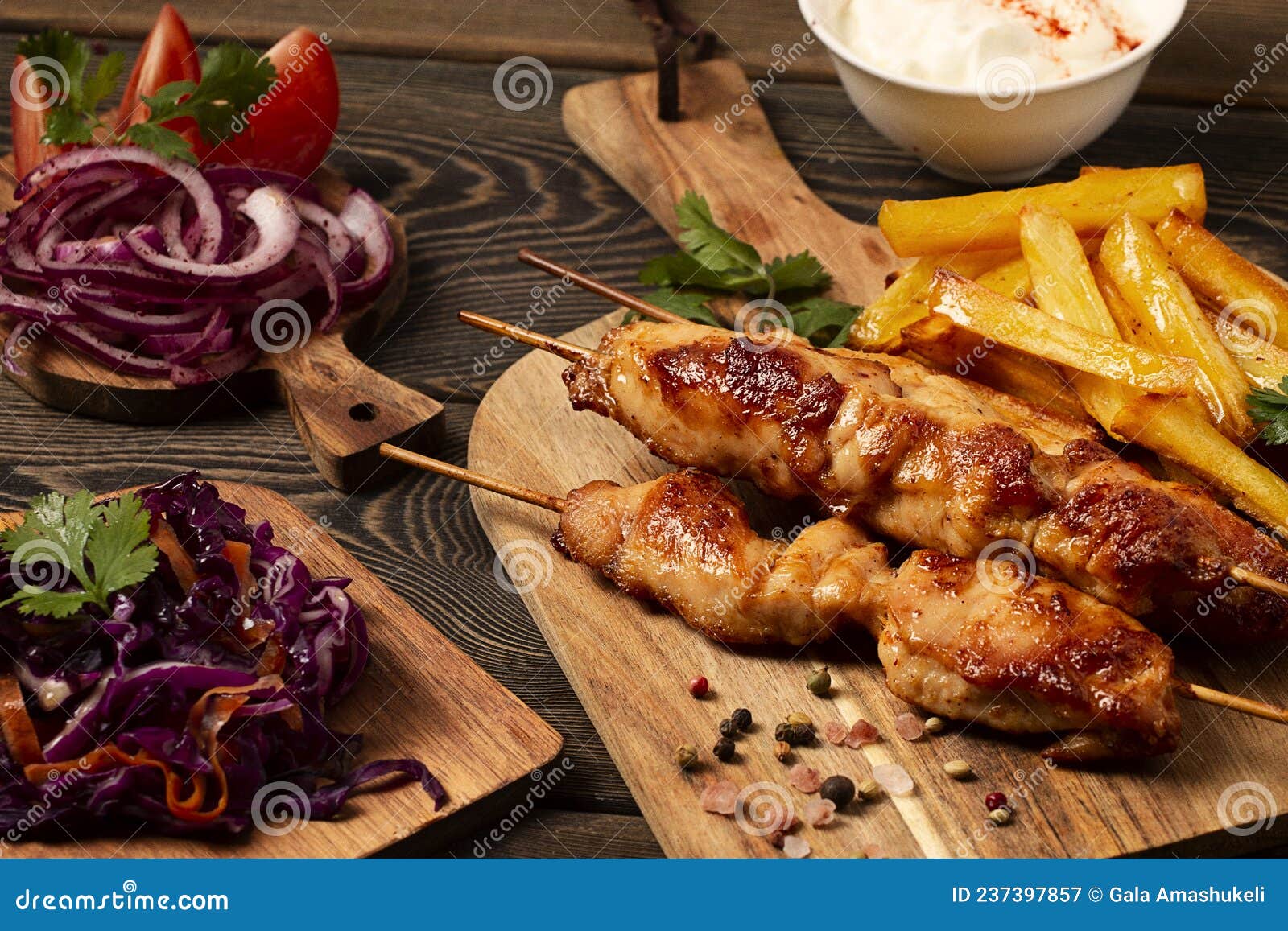 Arabic Traditional Cuisine, Shish Tawk with Potatoes and Red Cabbage ...