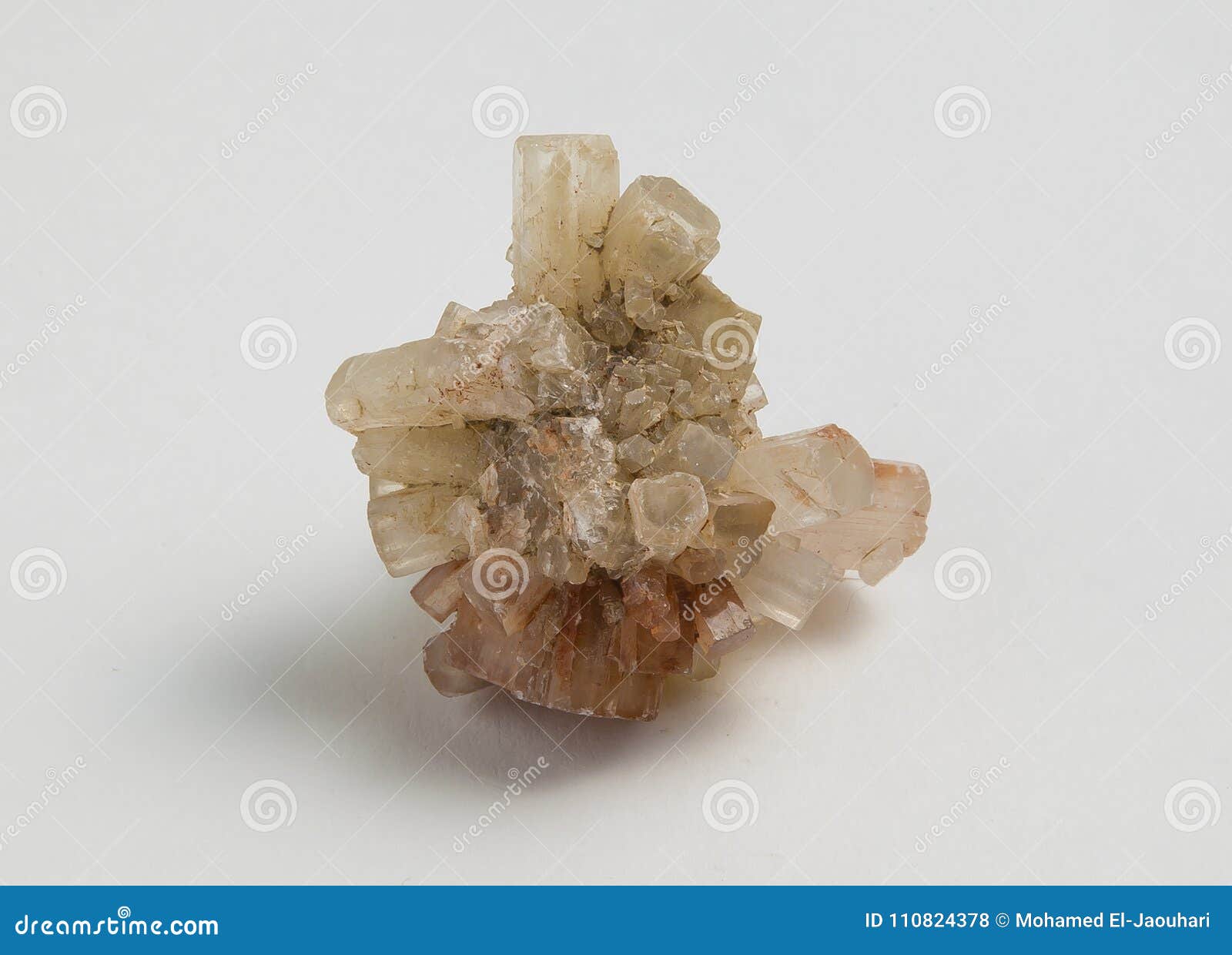 What is the title of this picture ? Ore Aragonite Crystal On White Background. Stock Photo - Image of