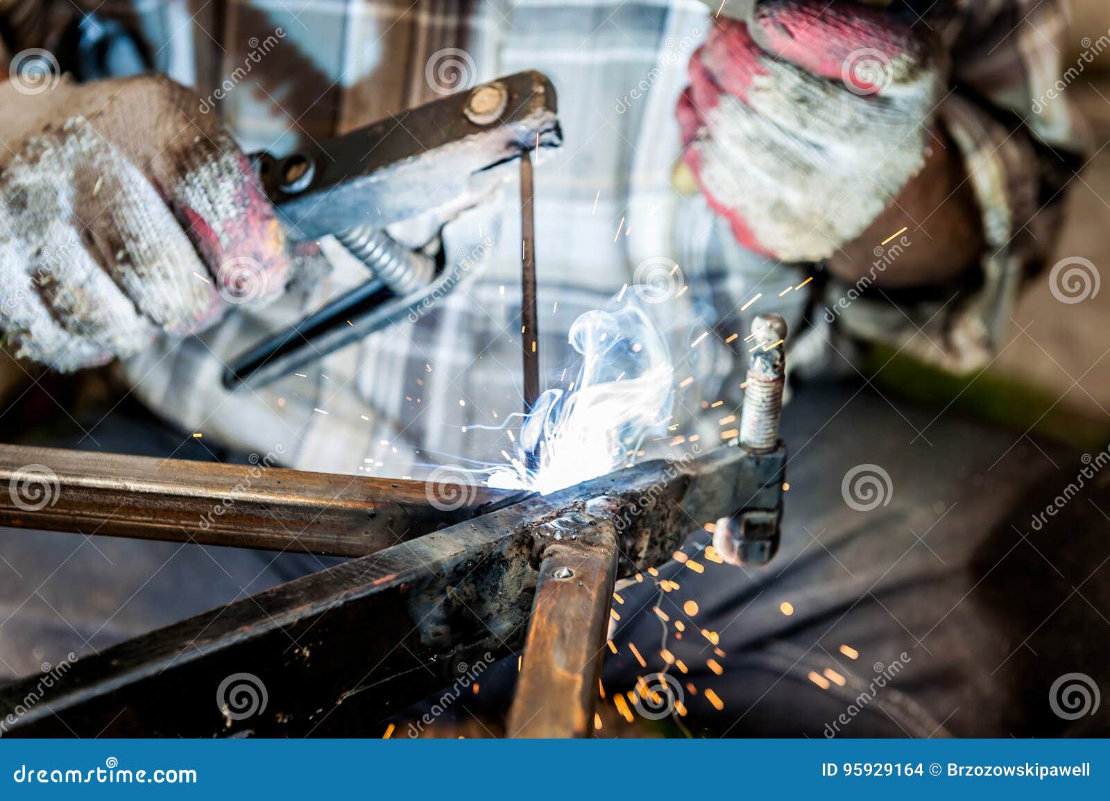 arc flash welding with sparkles close up