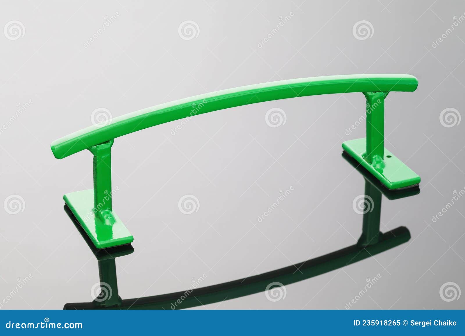 Arc Shaped Metal Railing for Small Skateboards on a Gradient Background