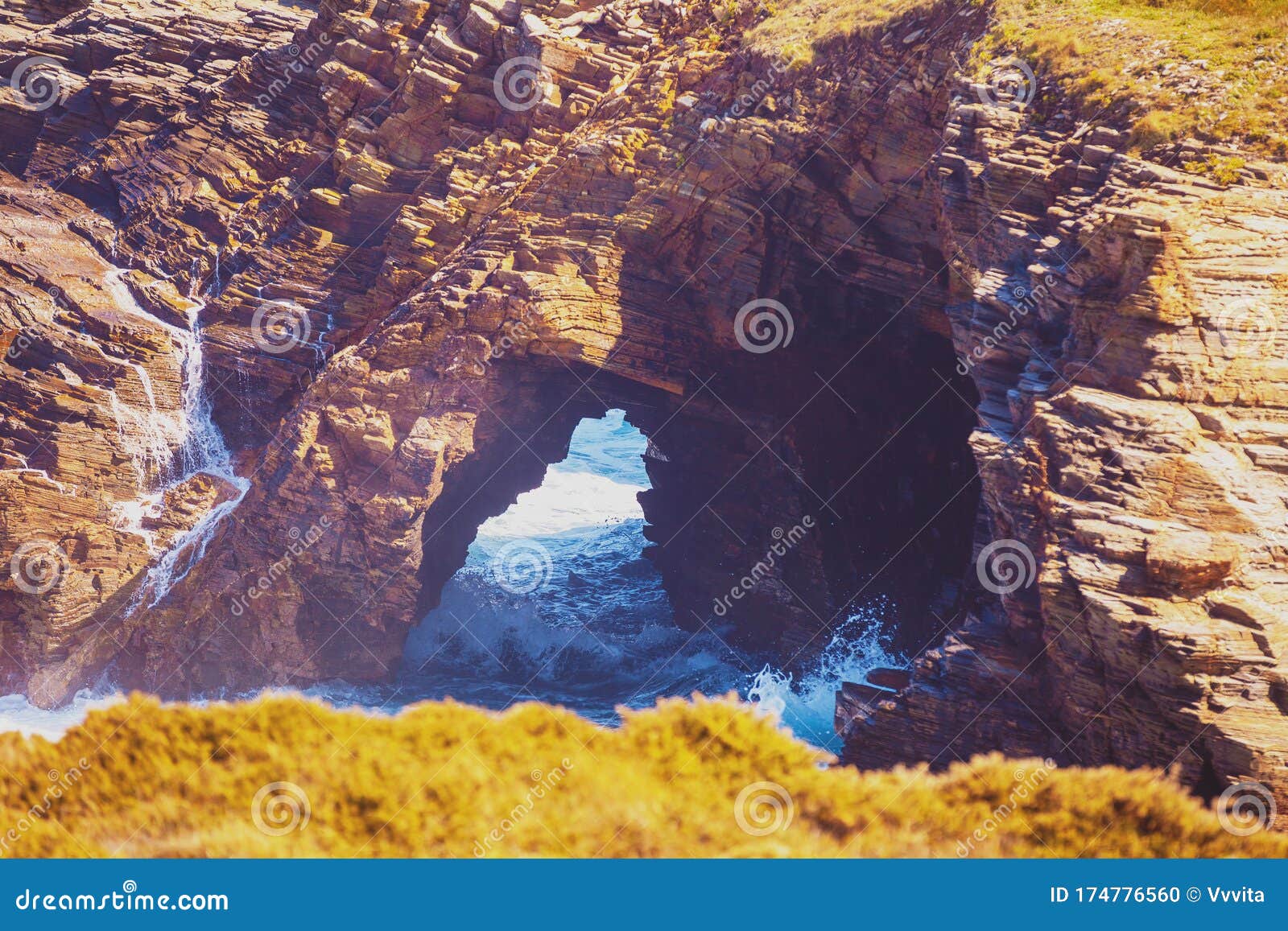 arch in the rock. beach playa de augas santas