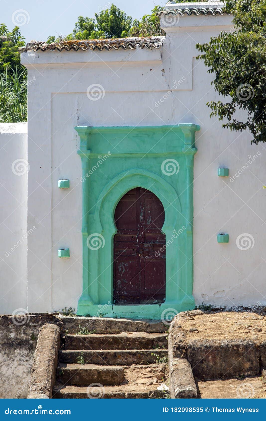 the  arched doorway of a muslim building at chellah in morocco.