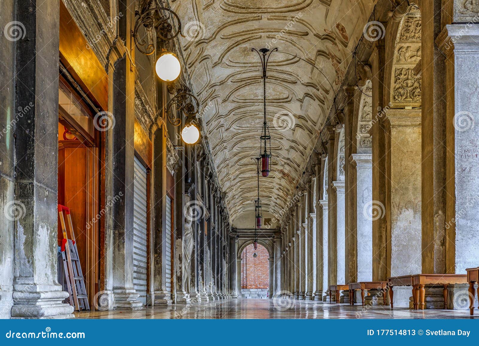 arched gallery of national library of st mark or biblioteca nazionale marciana on piazza san marco square, venice italy