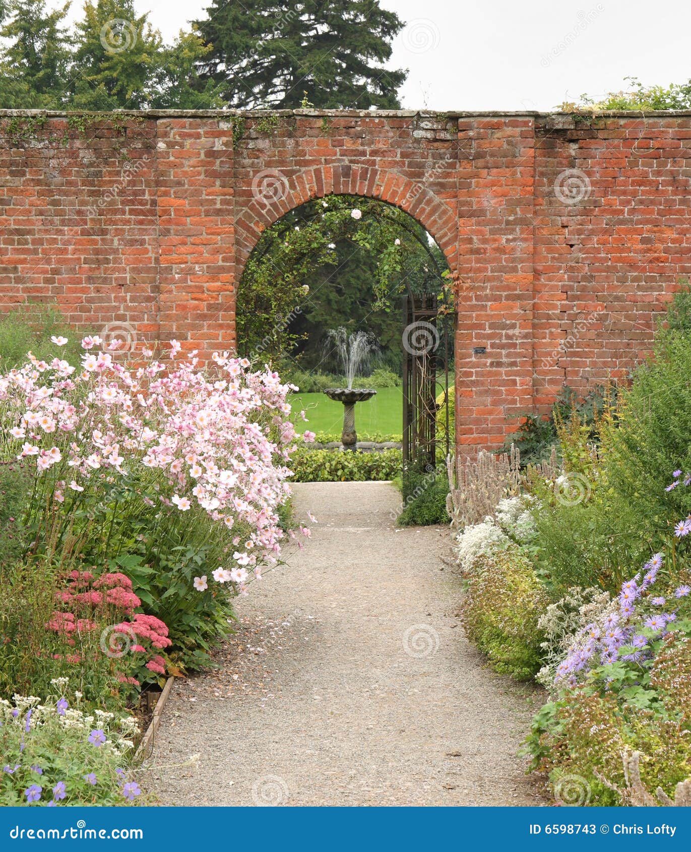 arched gateway to an english walled garden