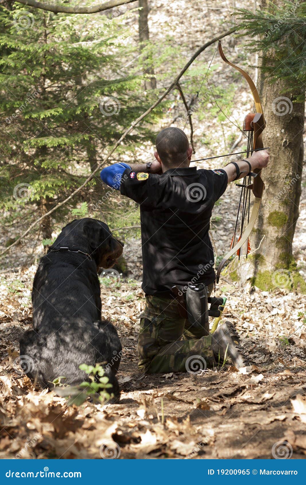 Archer with a dog editorial image. Image of arrow, archer 19200965
