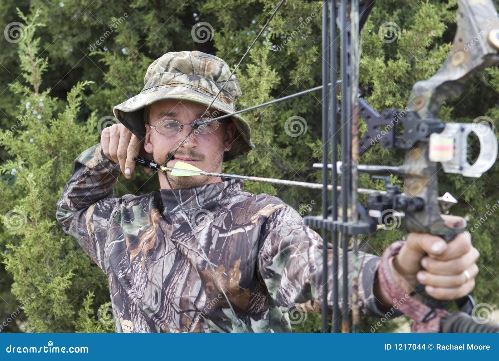 Archery hunter with bow stock photo. Image of sporting 1217044