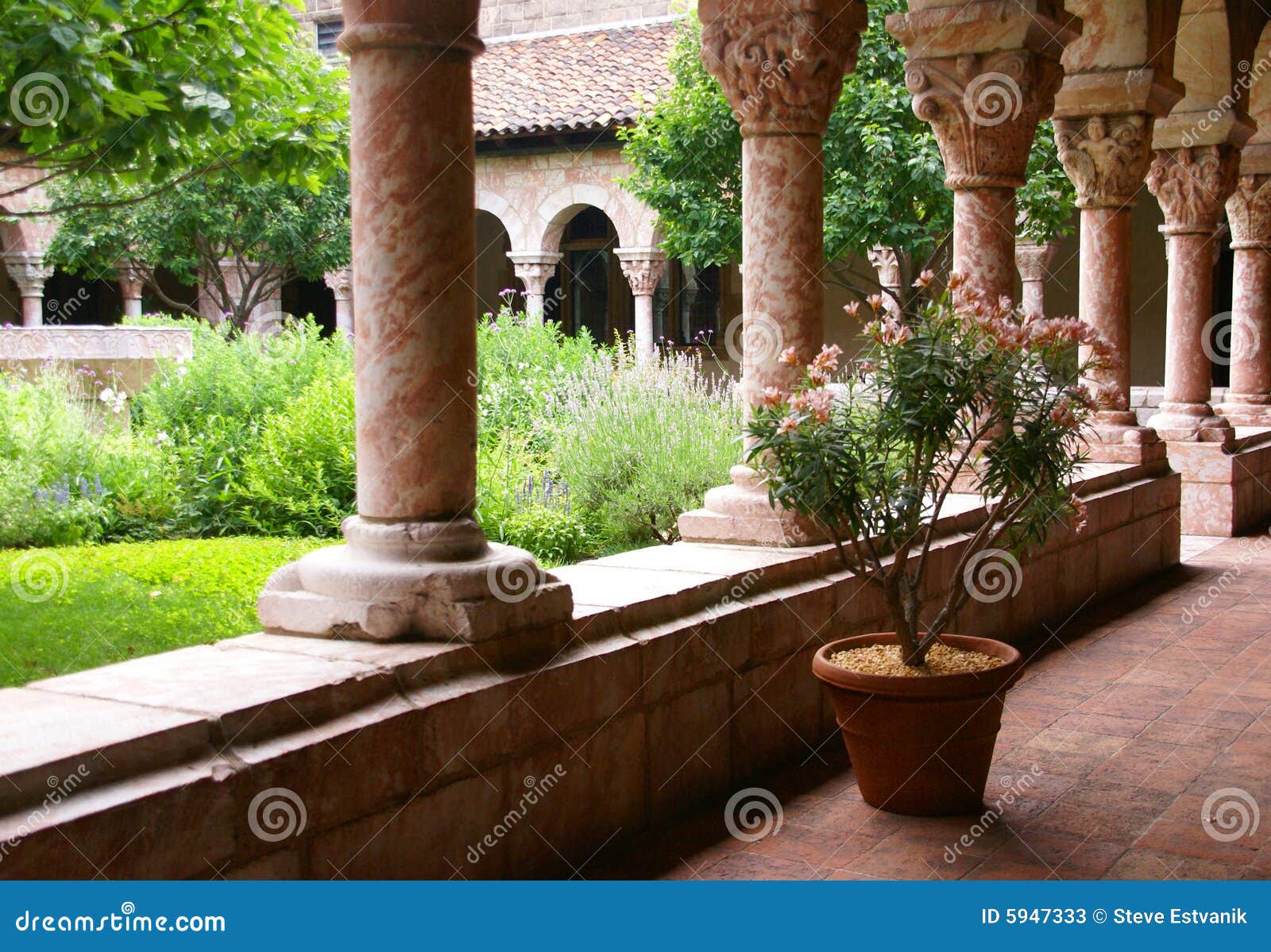 Arches and carved columns, medieval Cloisters, New York City