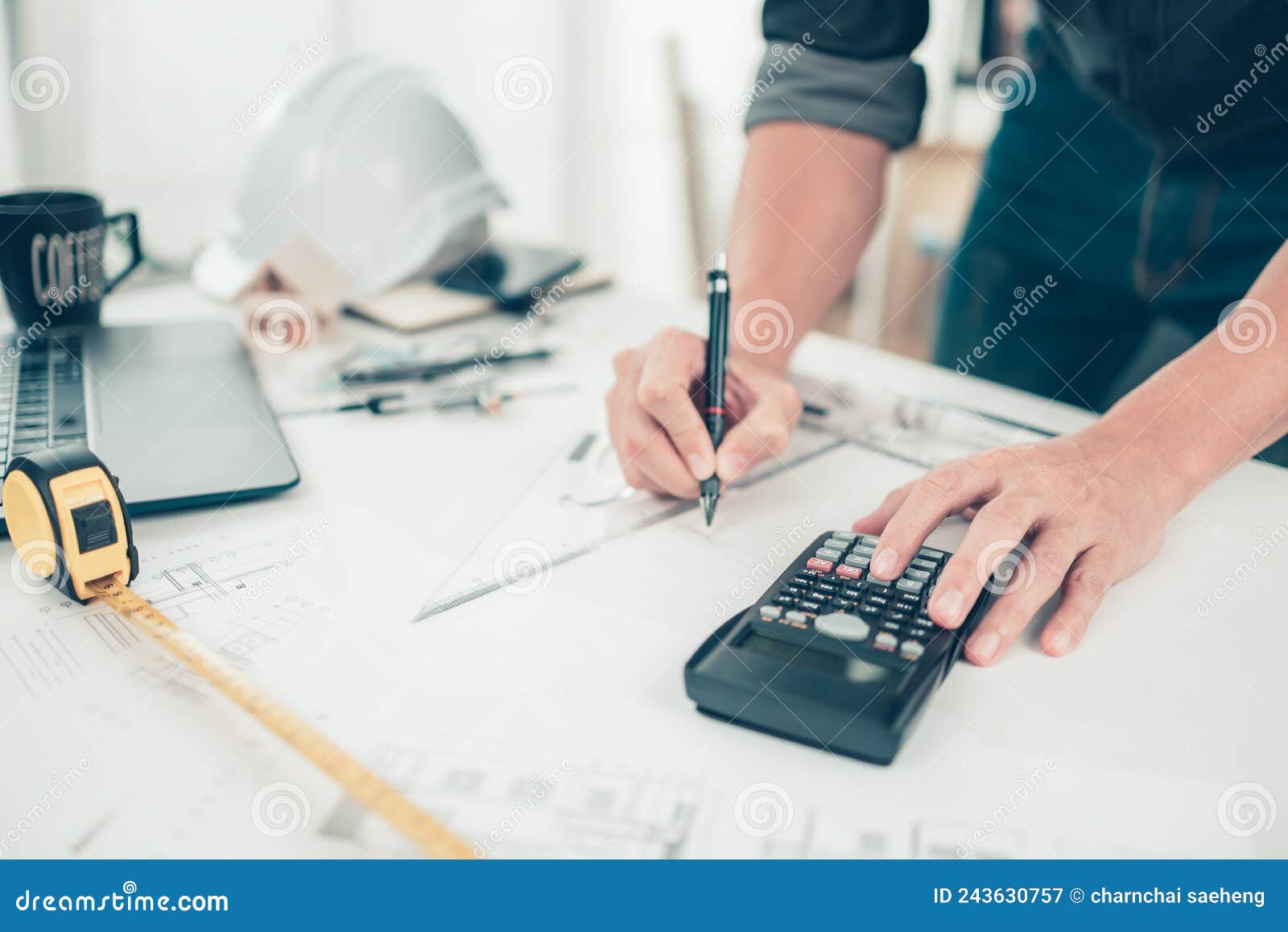 Architect Engineer Use Calculator for Calculate Drawing Design Working