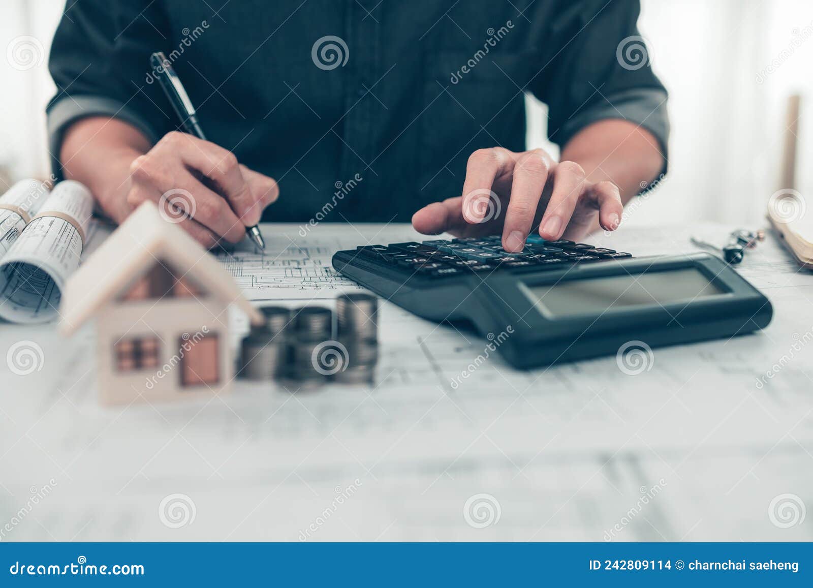 Architect Engineer Use Calculator Check Cost House Design on Blueprint