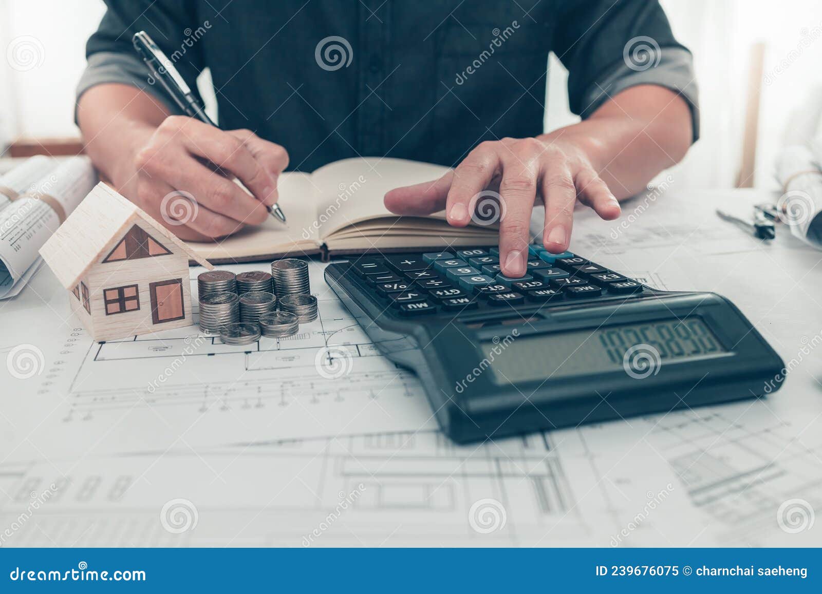 Architect Engineer Use Calculator Check Cost House Design on Blueprint