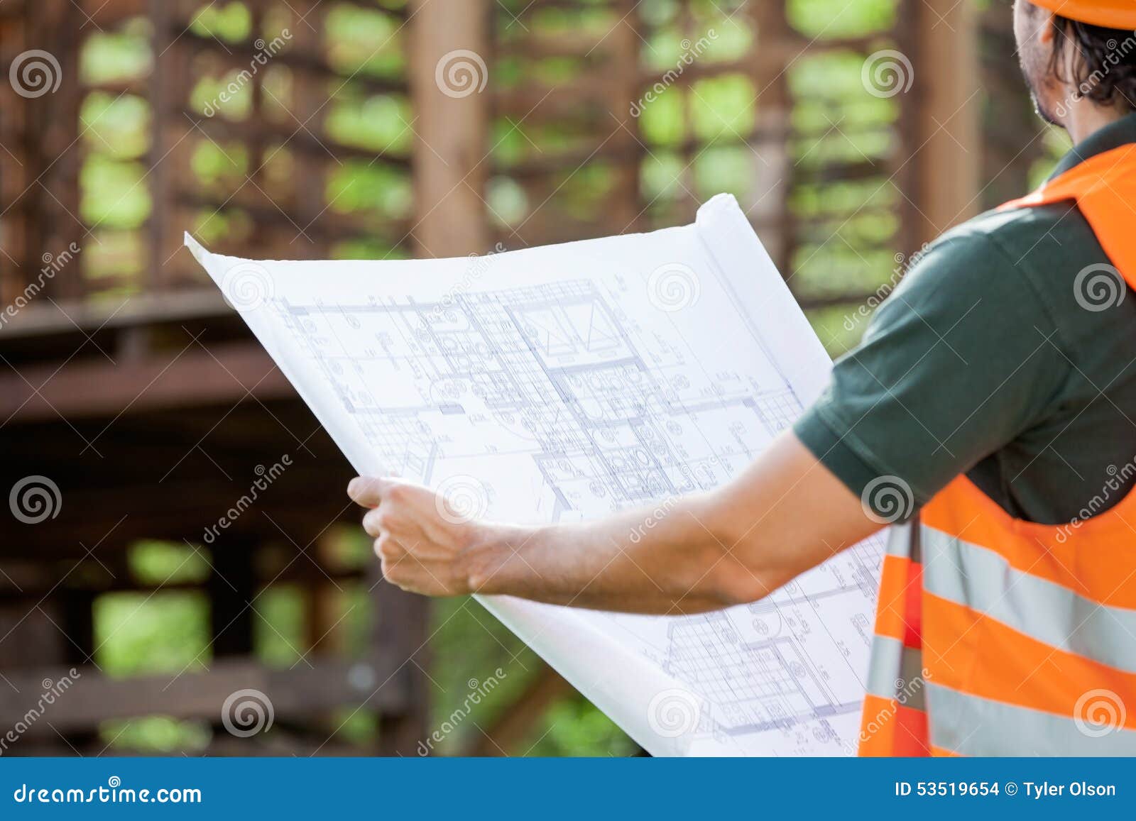 Architect Holding Blueprint at Construction Site Stock Photo Image of