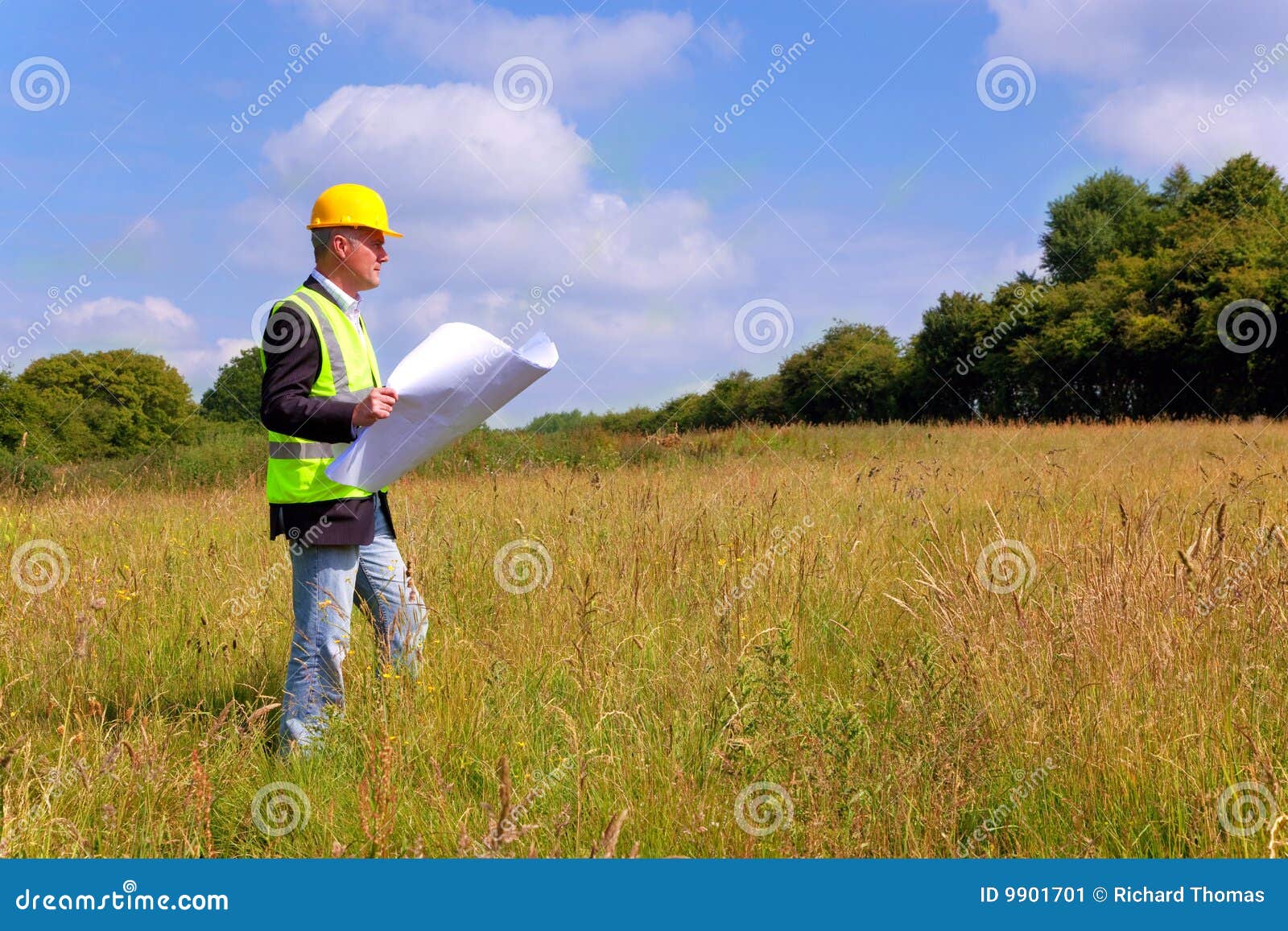 architect surveying a new building plot