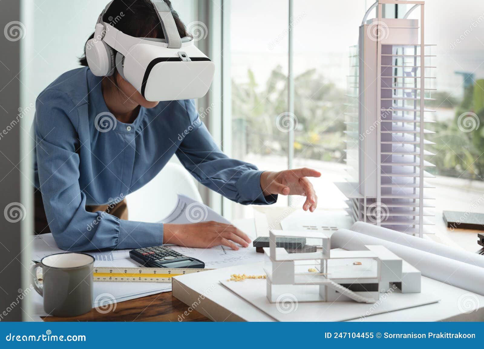 Architects Female Wearing Virtual Reality Headsets for Work with Virtual Reality Modeling