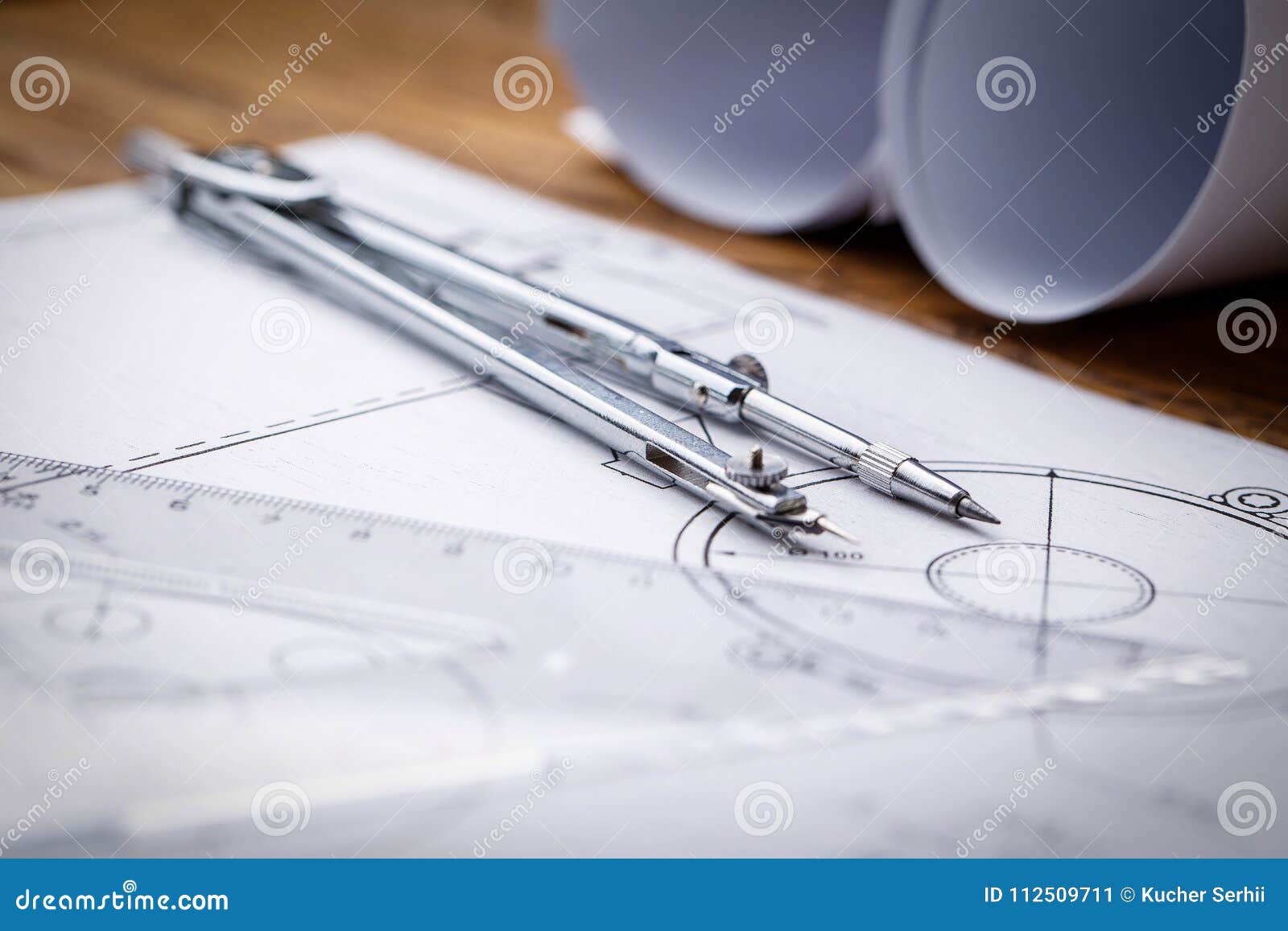 Architectural Blueprints and Blueprint Rolls and a Drawing Instruments