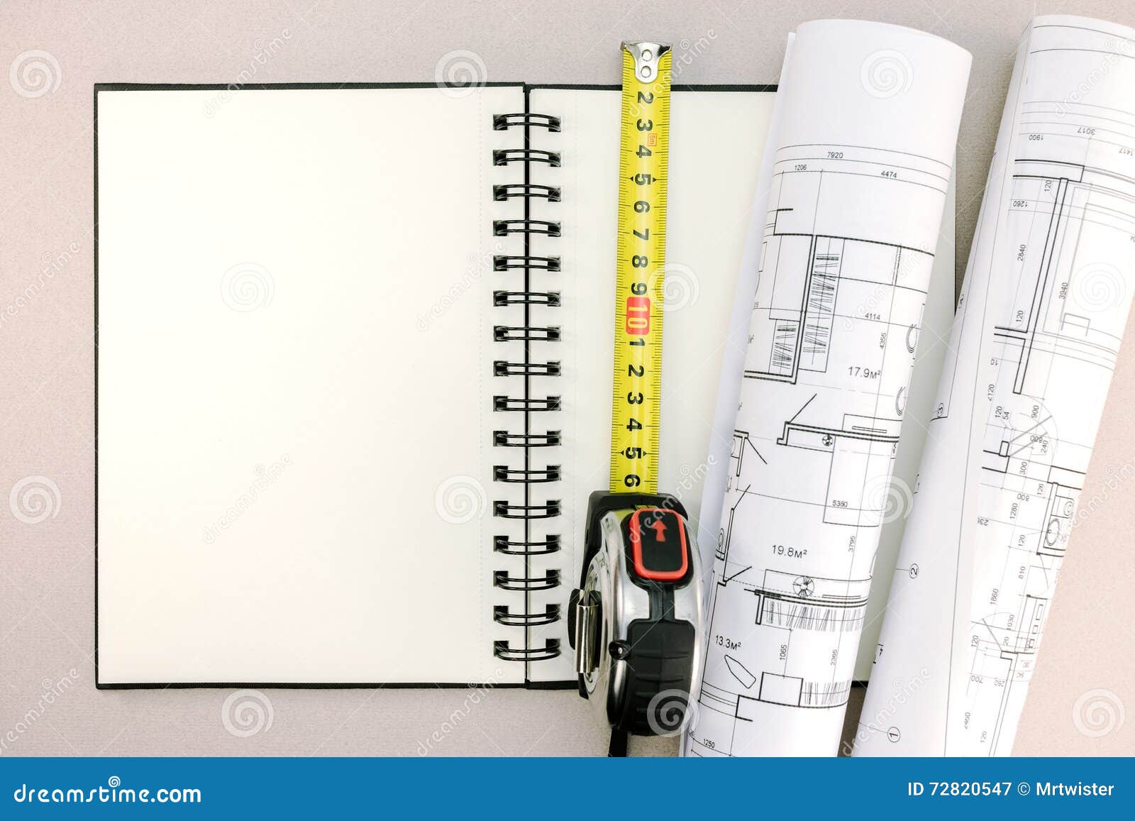 Architectural Project with Notepad and Tape Measure on Desk Stock Image
