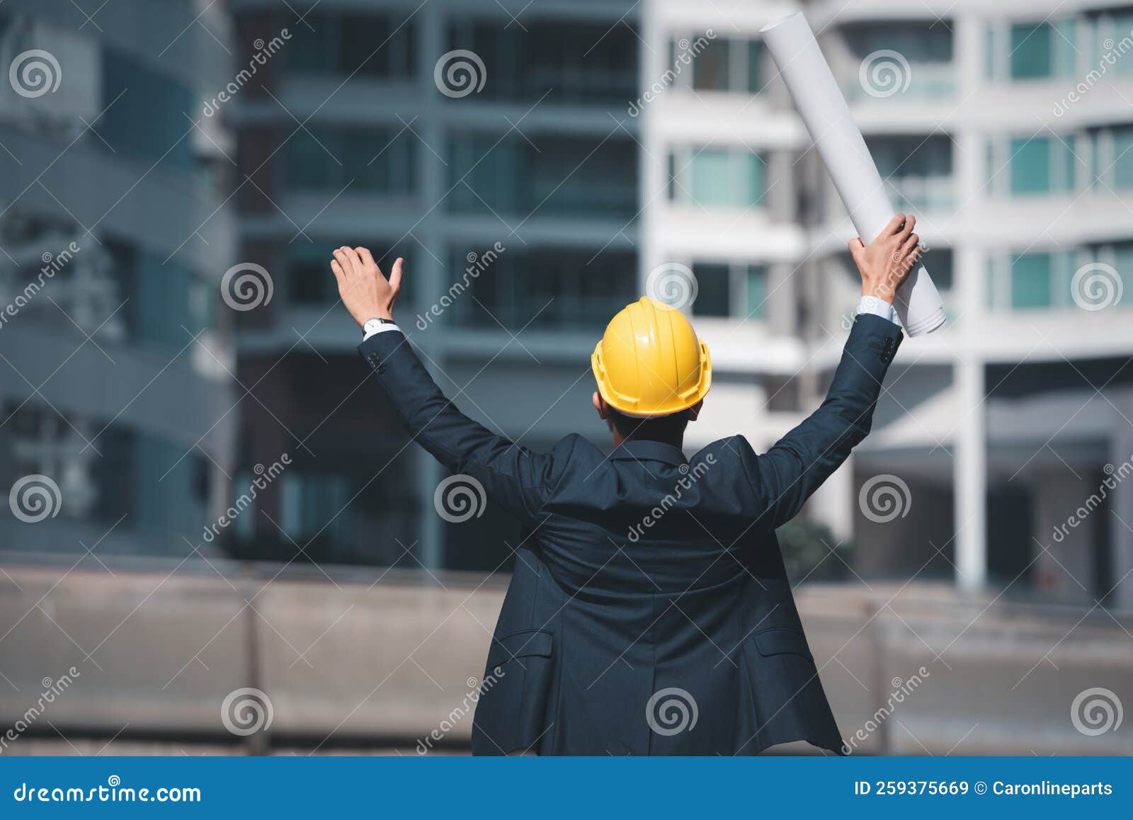 Architecture Engineer Raised Hands and Holding Blueprint To Showing