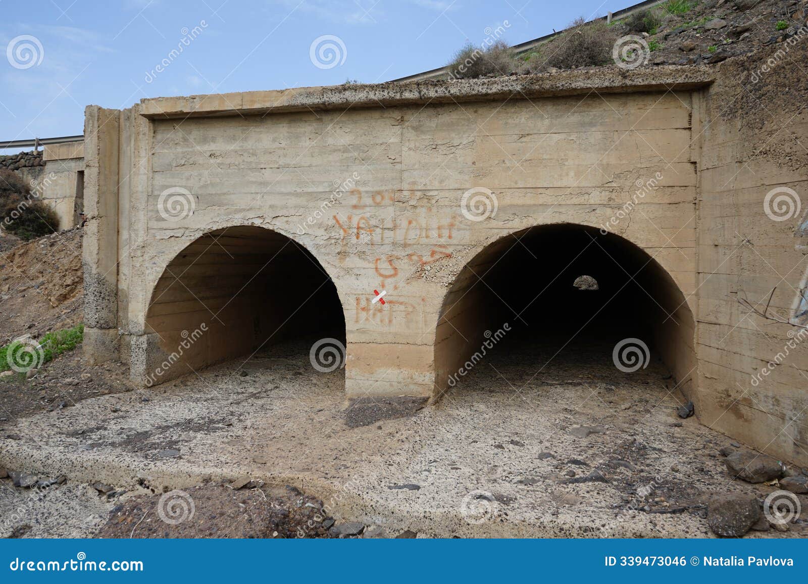 the tunnels are located under the fv-2 highway near the valluelo de la cal dirt road in las gaviotas, fuerteventura.