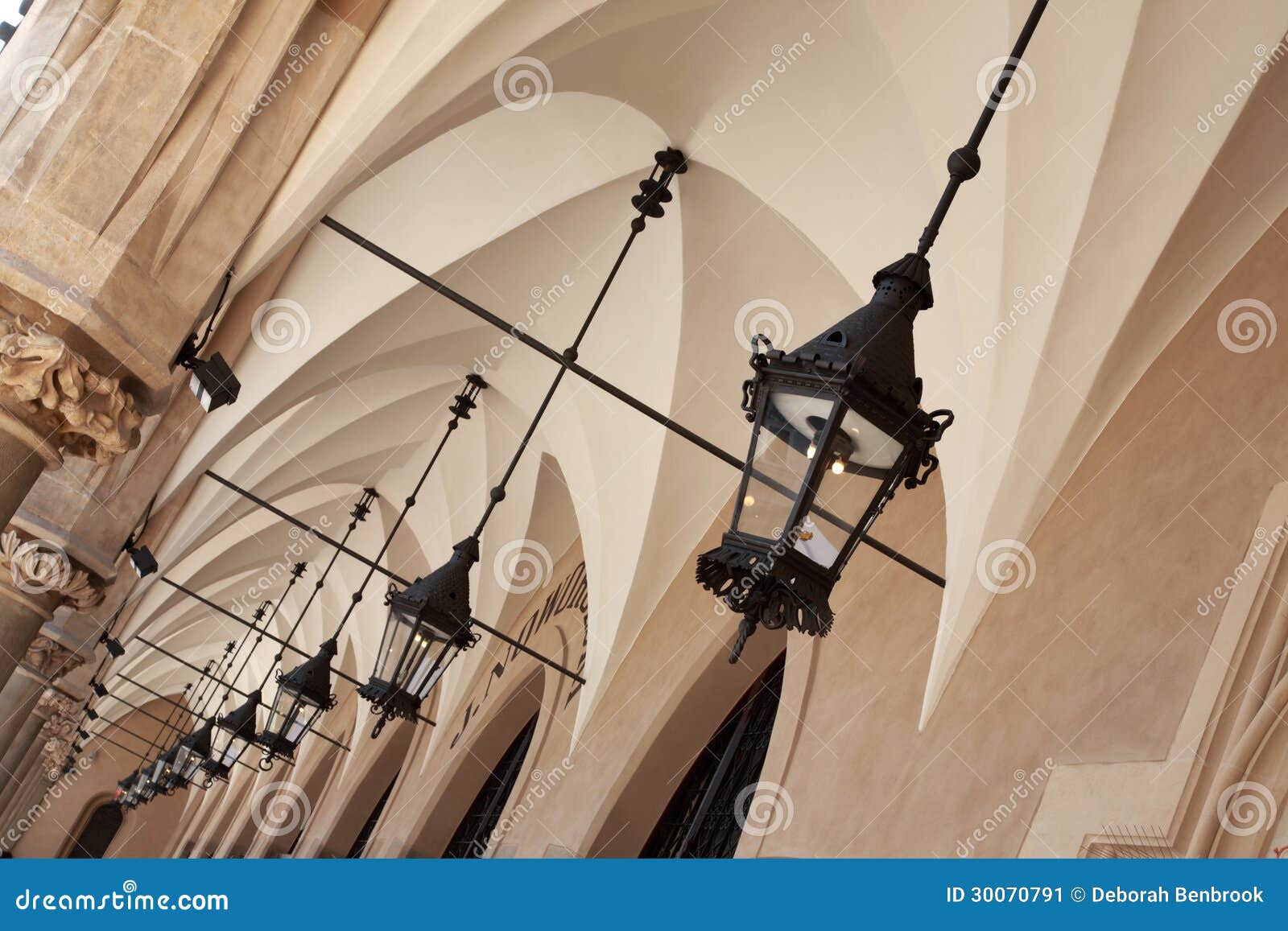 archways under cloth hall, krakow