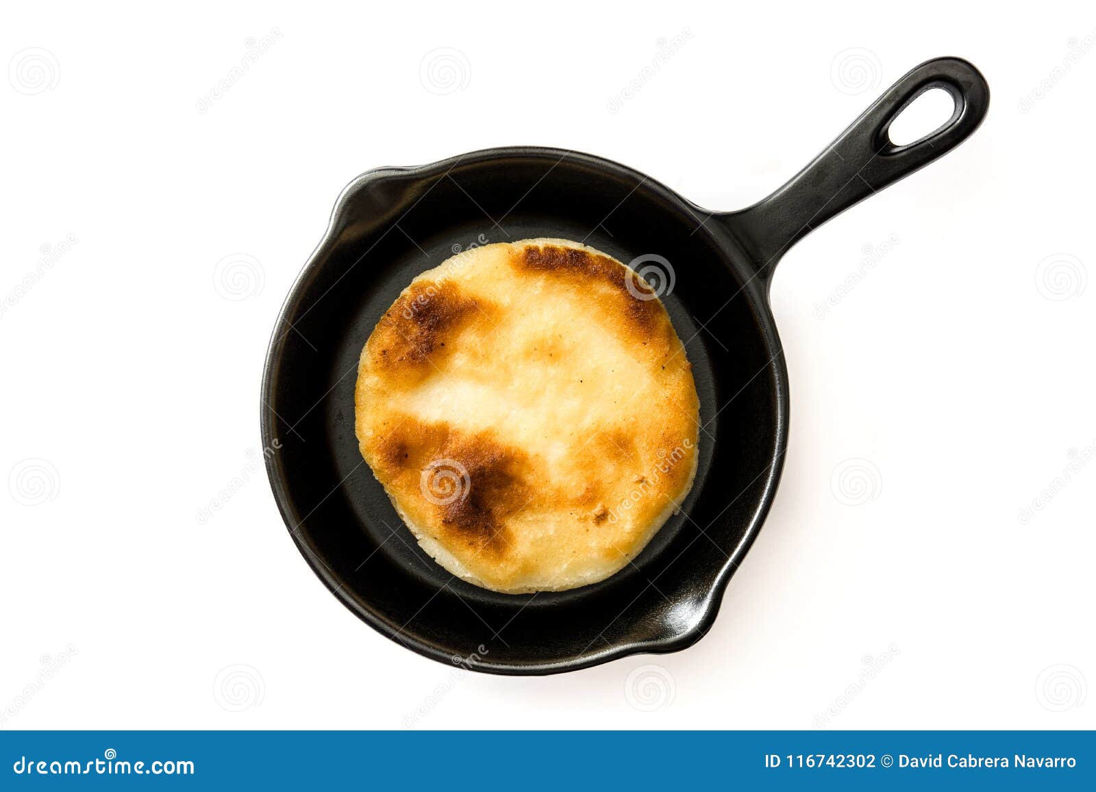 arepas in frying pan  . venezuelan typical food. top view.