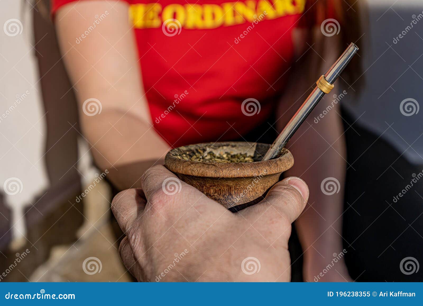argentinean woman sharing a traditional mate