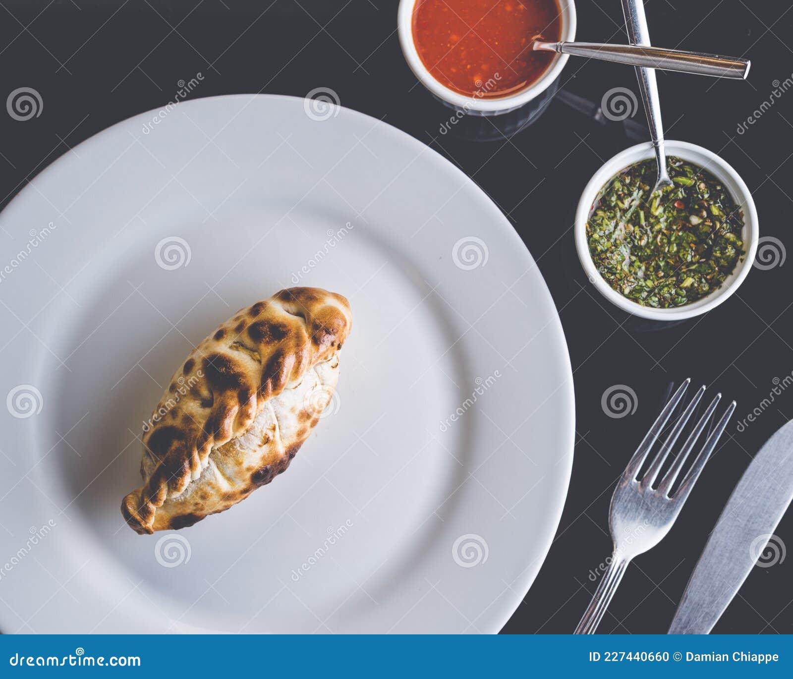 Argentinian Empanada Inside A Clay Oven In A Restaurant Stock Photo