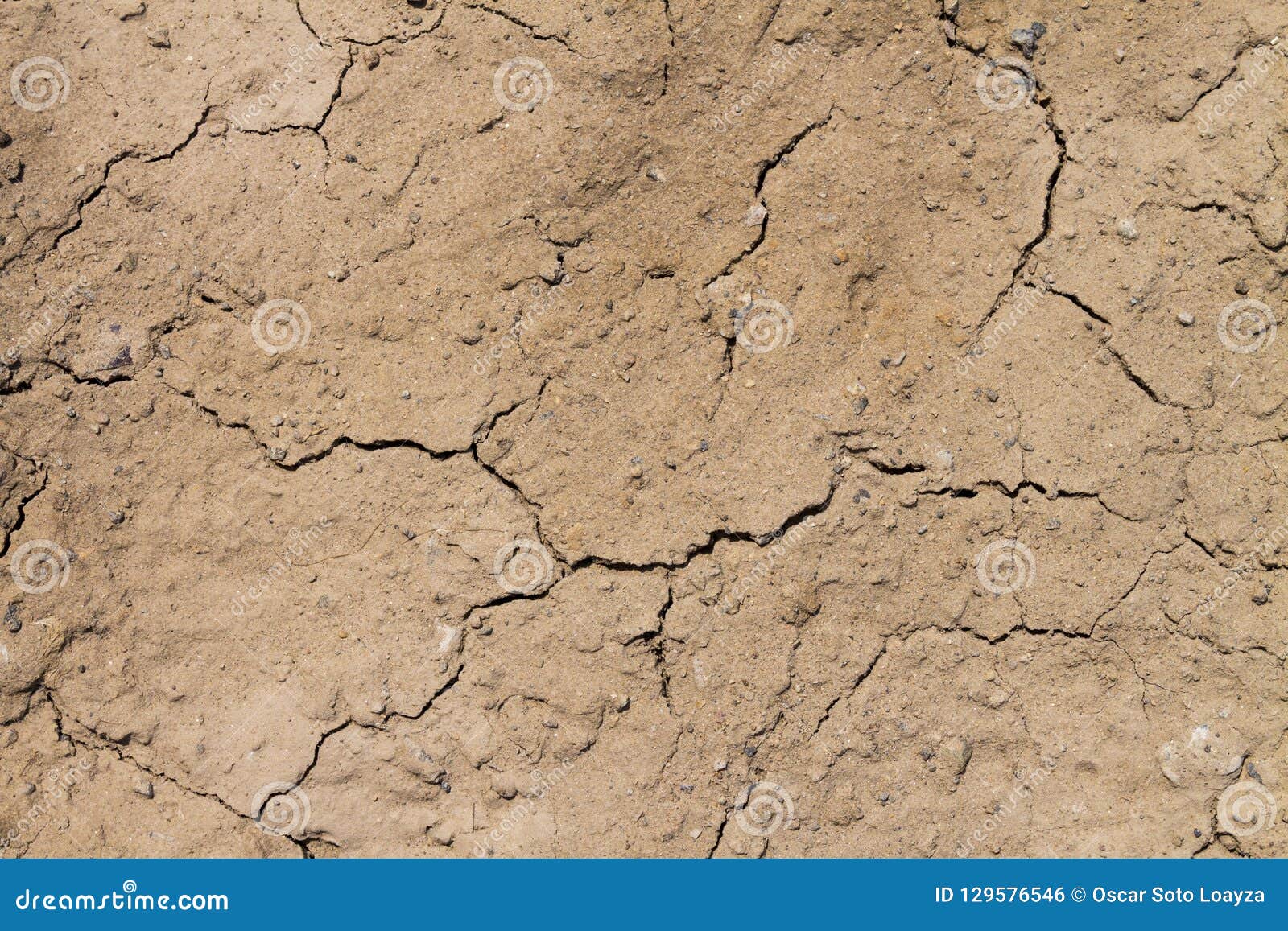 arid soil with cracks and desert look heart background