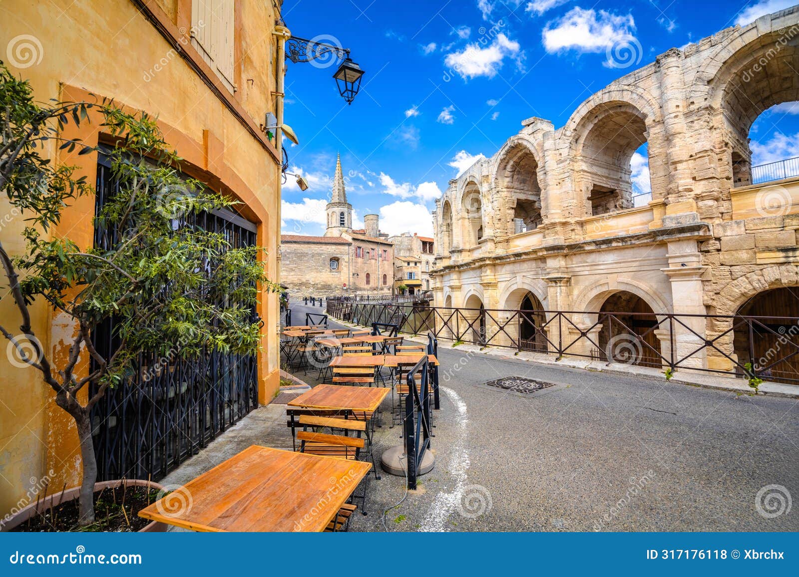 arles amphitheatre and colorful street architecture view