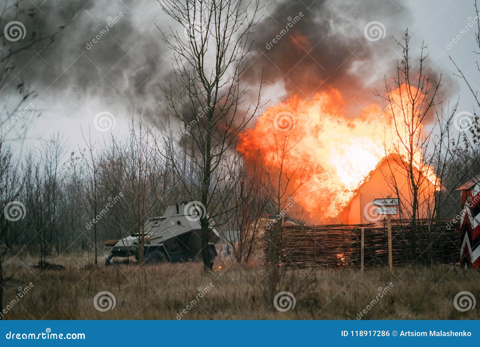 armored soviet troops near the burning building