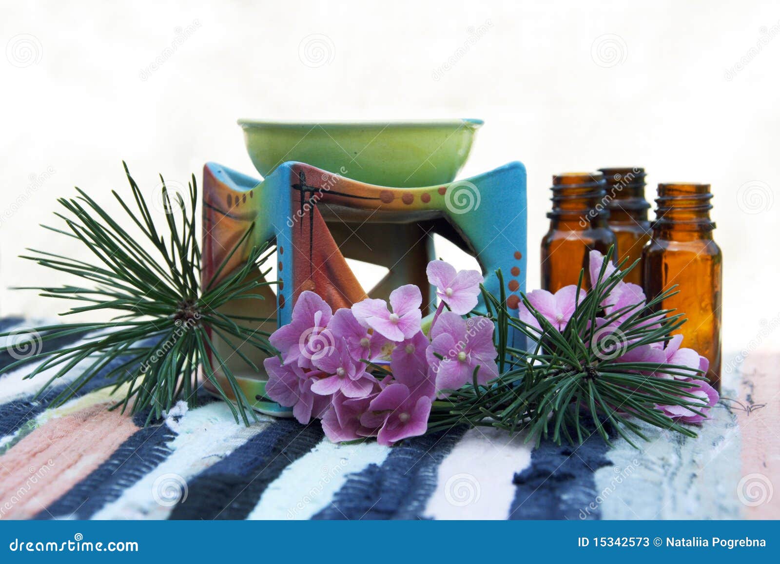 Aroma Oil in Bottles and Candle Bowl Stock Image Image of herb